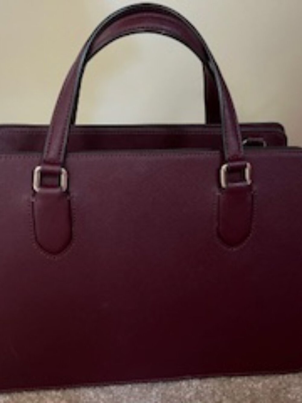 Kate Spade handbag with 2 interior snap pockets and 1 zipper pocket. - Picture 2 of 3